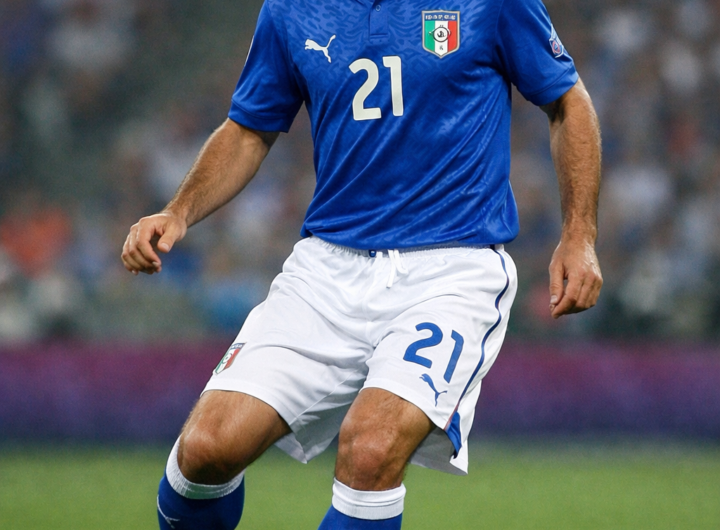 Andrea Pirlo controlling the ball in Italy’s blue jersey during a match