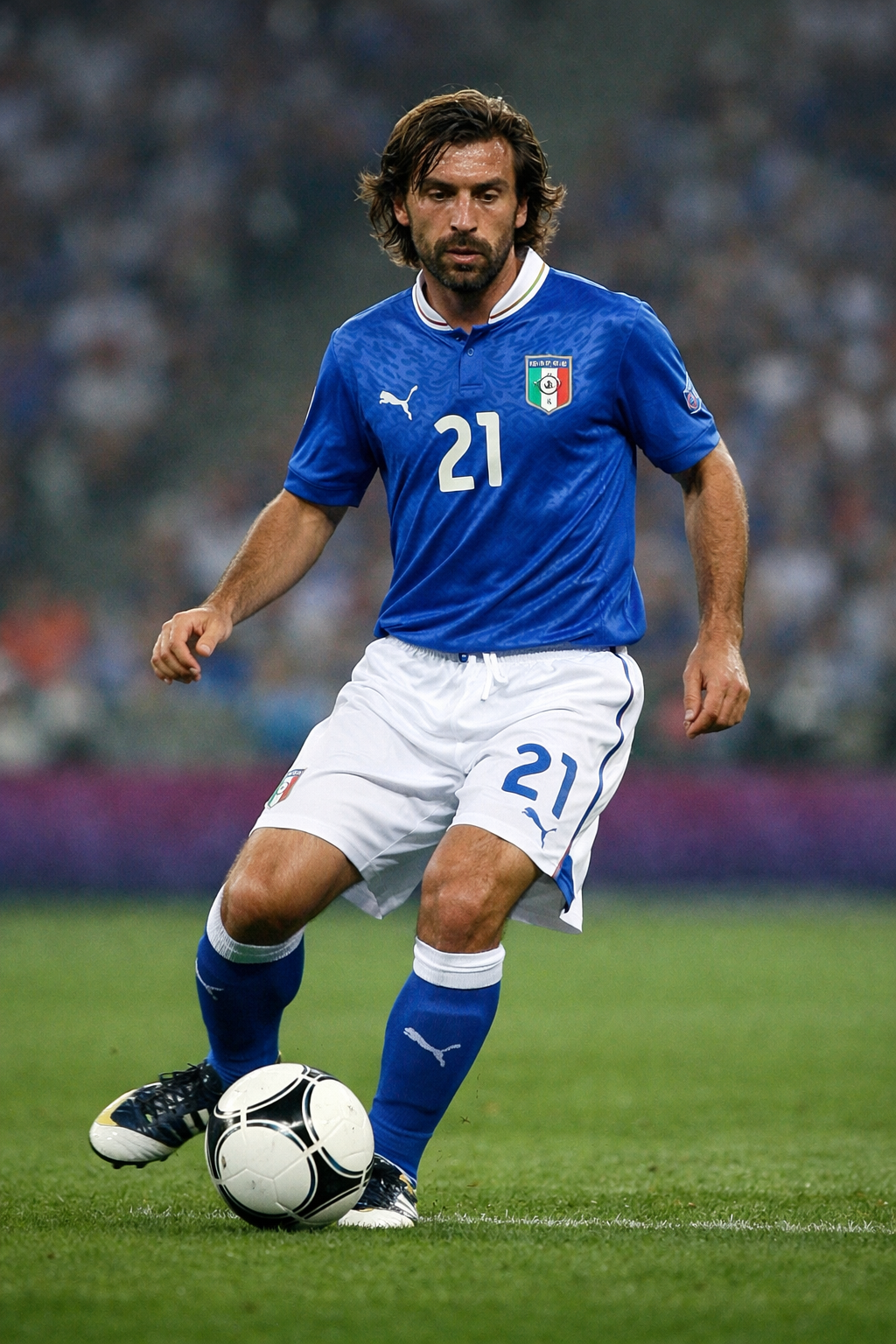 Andrea Pirlo controlling the ball in Italy’s blue jersey during a match