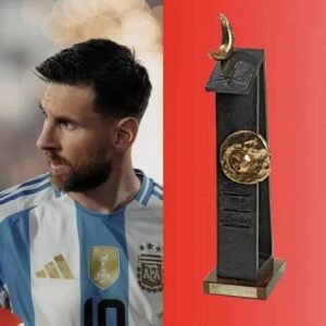 Lionel Messi looking disappointed after a match, symbolizing the GOAT debate.